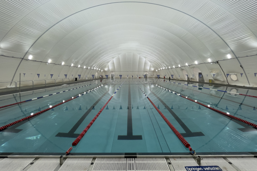 Outdoor pool roofing with Paranet airdome
